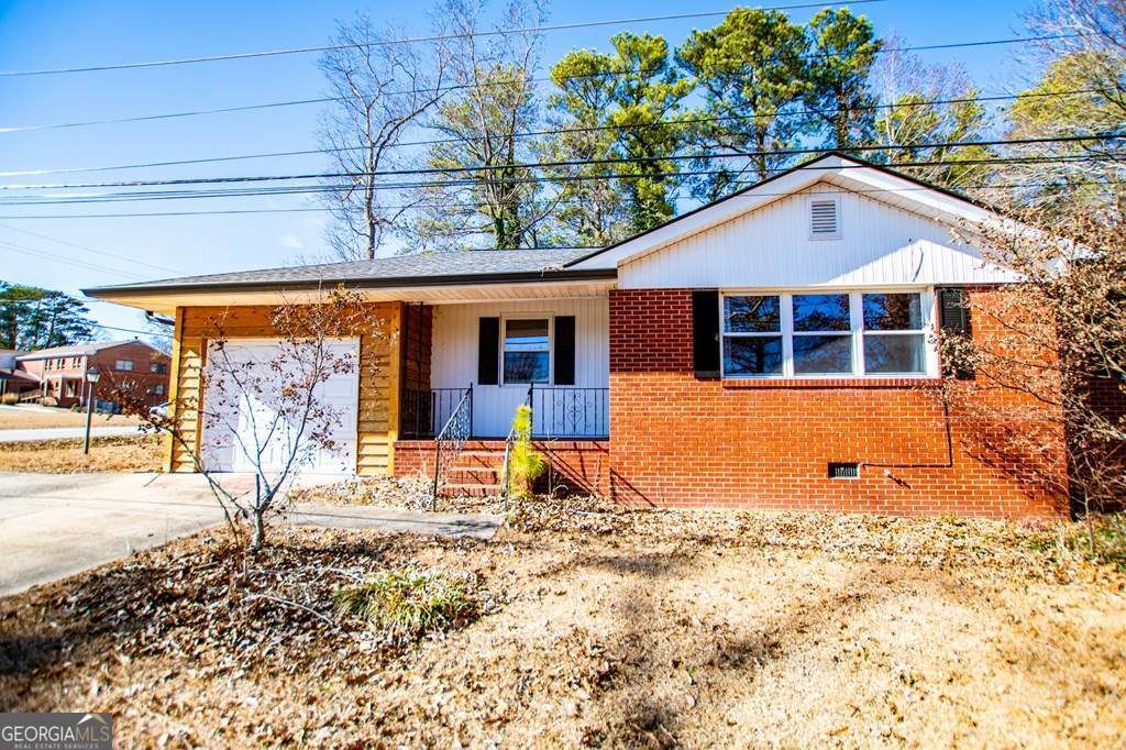 Walk to church and school from this updated all brick ranch home. The kitchen has been completely updated with solid surface countertops, new appliances and stainless steel farm house sink. It has a fenced in back yard with an attached deck and a 10x10 outbuilding. For those craving a more immersive nature experience, Sweetwater Creek State Park is nearby, offering hiking trails, fishing spots, and breathtaking views. Be the first to see this great opportunity. Priced to sell!