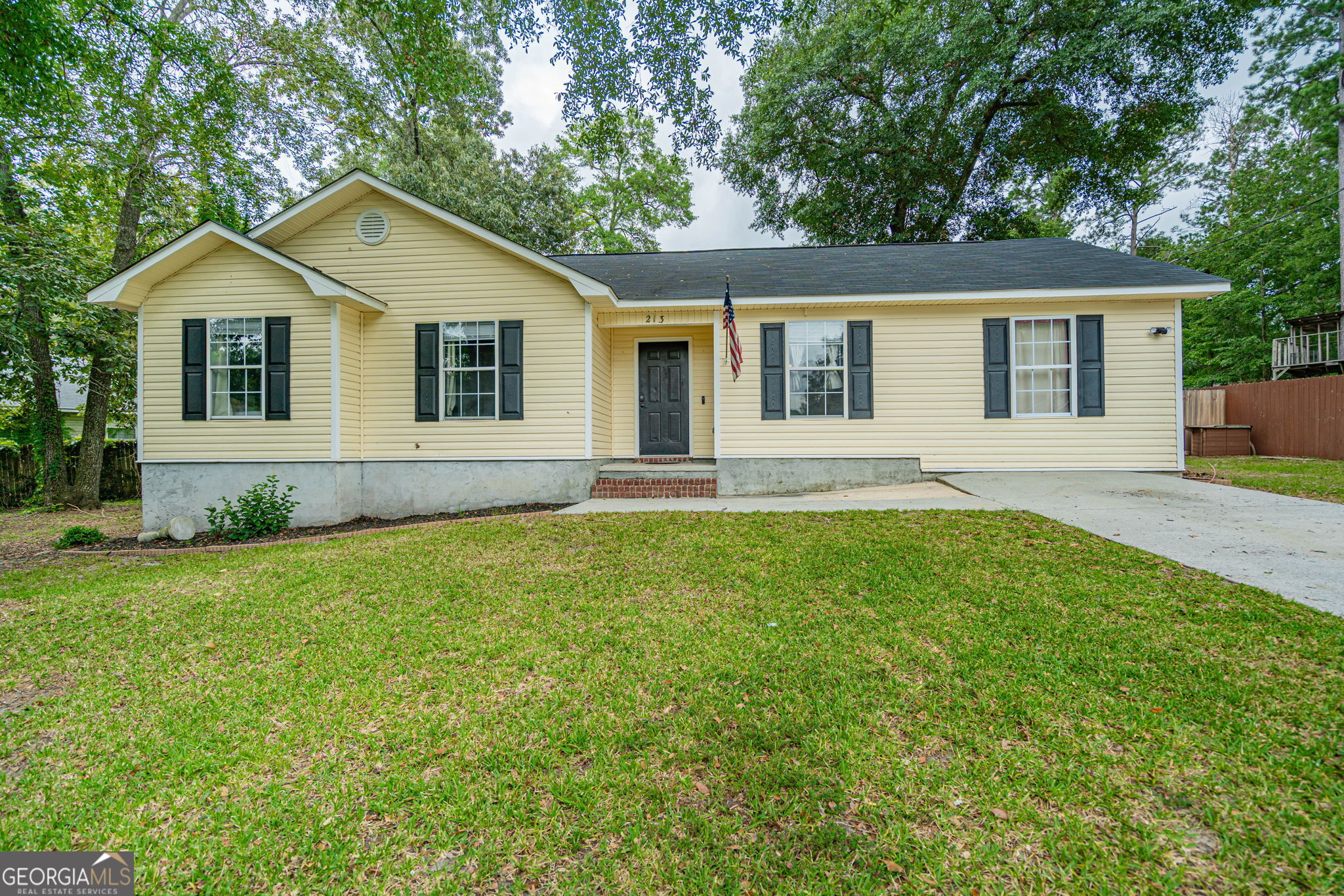 Seller is offering $5,000 in concessions! Welcome to your new home tucked away in a quiet cul-de-sac in the heart of Effingham County where there's no HOA to worry about! Sitting on a spacious .35-acre lot, this 4-bedroom, 2-bath home offers both comfort and convenience. The fully fenced backyard features a 12x12 powered workshop, a 12x18 lean-to for extra storage, and a separate enclosed area ideal for pets. Inside, you'll find a bright and open floor plan with cathedral ceilings in the living area, a formal dining room, and a well-appointed kitchen with a breakfast nook and large pantry. The home also includes two water heaters, one of which is a Rinnai tankless system for added efficiency. Don't miss out!!