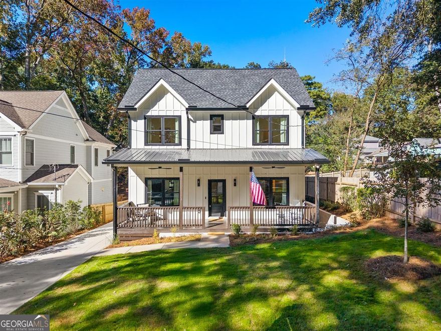 Welcome to this stunning new construction home where timeless design meets modern convenience. Stunning floors flow throughout the home, complementing an open-concept layout filled with natural light. The living room features a cozy fireplace flanked by custom built-ins, while the chef's kitchen boasts gorgeous stainless steel appliances, a luxurious butler's pantry to keep prep messes out of sight, and a spacious walk-in pantry for all your storage needs. The thoughtfully designed mudroom includes entrances from both the backyard and the garage, so outdoor messes are always contained. Upstairs, the oversized primary suite is a true retreat with French doors, double closets, dual vanities, a massive tiled walk-in shower, and a freestanding soaking tub. Just outside the suite, a bright reading nook offers a peaceful place to unwind. The expansive, fenced backyard is a rare find on a quiet street-perfect for entertaining, adding a pool or guest house, or simply enjoying the green space. The garage is already wired and ready for your EV charger. Conveniently located near I-20, this home offers quick and easy access for commuting downtown. With walkable access to the Eastside Trolley Trail, Coan Park, Kirkwood Dog Park, and all the dining and entertainment at Pullman Yard, this property delivers an unbeatable combination of lot size, lifestyle, and location-truly a rare opportunity in the heart of it all.