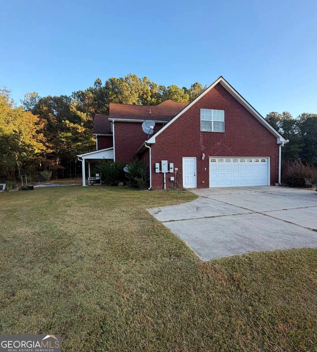 Photo of 258 Liberty Trace, Milner, GA 30257 (MLS # 10881668)