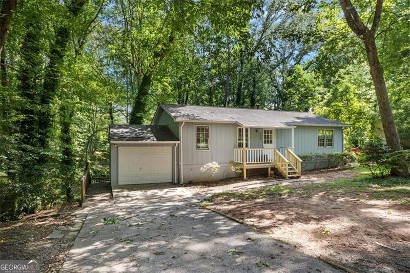 Charming Ranch located in a family-friendly neighborhood in Woodstock! 2 bedroom/1 bathroom on 1/2 acre + lot. A lovely home that offers endless potential. Open concept living room, dining room, and kitchen. You will love this incredible Woodstock location less than 4 minutes to Downtown Woodstock. A 1-car garage is attached. A full finished basement could be the perfect teen/in-law suite! The basement offers space for bedrooms/flex space/home office/bonus room and also has a full bath, full kitchen, and a laundry room. Best of all, with no HOA or Rental Restrictions you can make this home your own. You will enjoy quick access to great schools,nature trails,dog parks,restaurants, shopping, farmer's markets, and more! Bring your ideas to make this home yours!