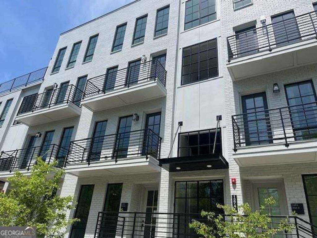 Photo of 990 Bibbs Circle NW #32, Atlanta, GA 30318 (MLS # 10721488)