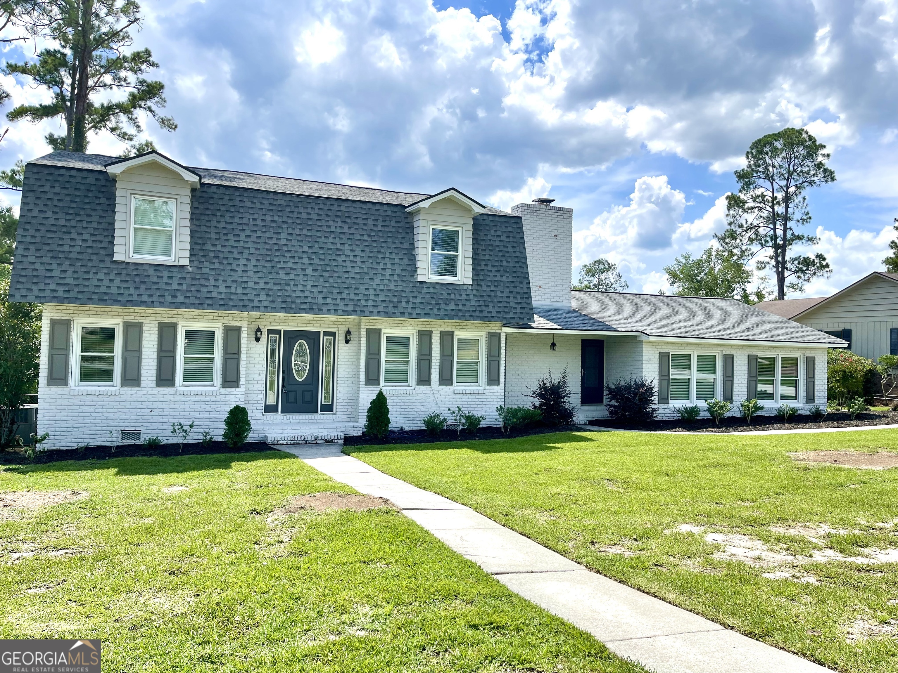 Welcome home, to this recently renovated retreat, conveniently located in Eager Subdivision! Step inside to find stunning upgrades, modern lighting, a congruent design theme, and plenty of space inside and out! This 4 bed/3 bath stunner is minutes from VSU, SGMC, and Moody Air Force Base. Move-in ready, complete with new roof, HVAC system, gas water heater, concrete driveway, and all new interior and exterior doors. The interior boasts new paint, tile, LVP, carpet, light fixtures, and hardware. Enjoy dinners prepared in your brand-new kitchen, equip with white quartz countertops and new stainless steel appliances. The master bedroom features a his and her walk-in closet, ample natural lighting, and a large custom bathroom, with double vanities, Japanese-style freestanding whirlpool tub, and a separate walk-in tile shower. Guest en-suite, with newly renovated bathroom, is located downstairs. Two more bedrooms and one bathroom, located upstairs. Have your morning coffee on the back porch, and enjoy the beautiful South Georgia weather from the privacy of your fenced-in backyard. Perfect for pets! Make your appointment to view this beauty, located in the heart of Valdosta! ONE-YEAR BUYERS WARRANTY INCLUDED WITH PURCHASE