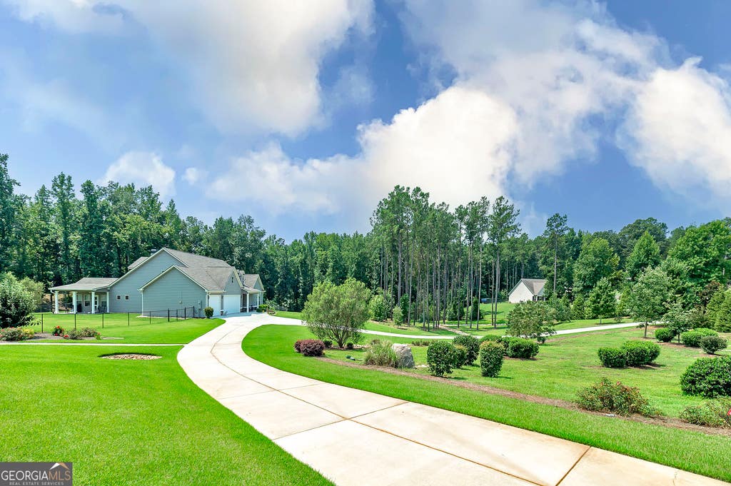 Photo of 90 Wagon Trail, Mansfield, GA 30055 (MLS # 10817349)