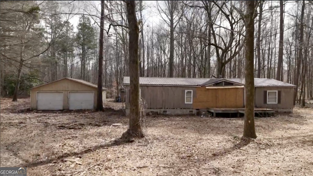 Photo of 5590 John Burruss Road, Cumming, GA 30040 (MLS # 10801464)