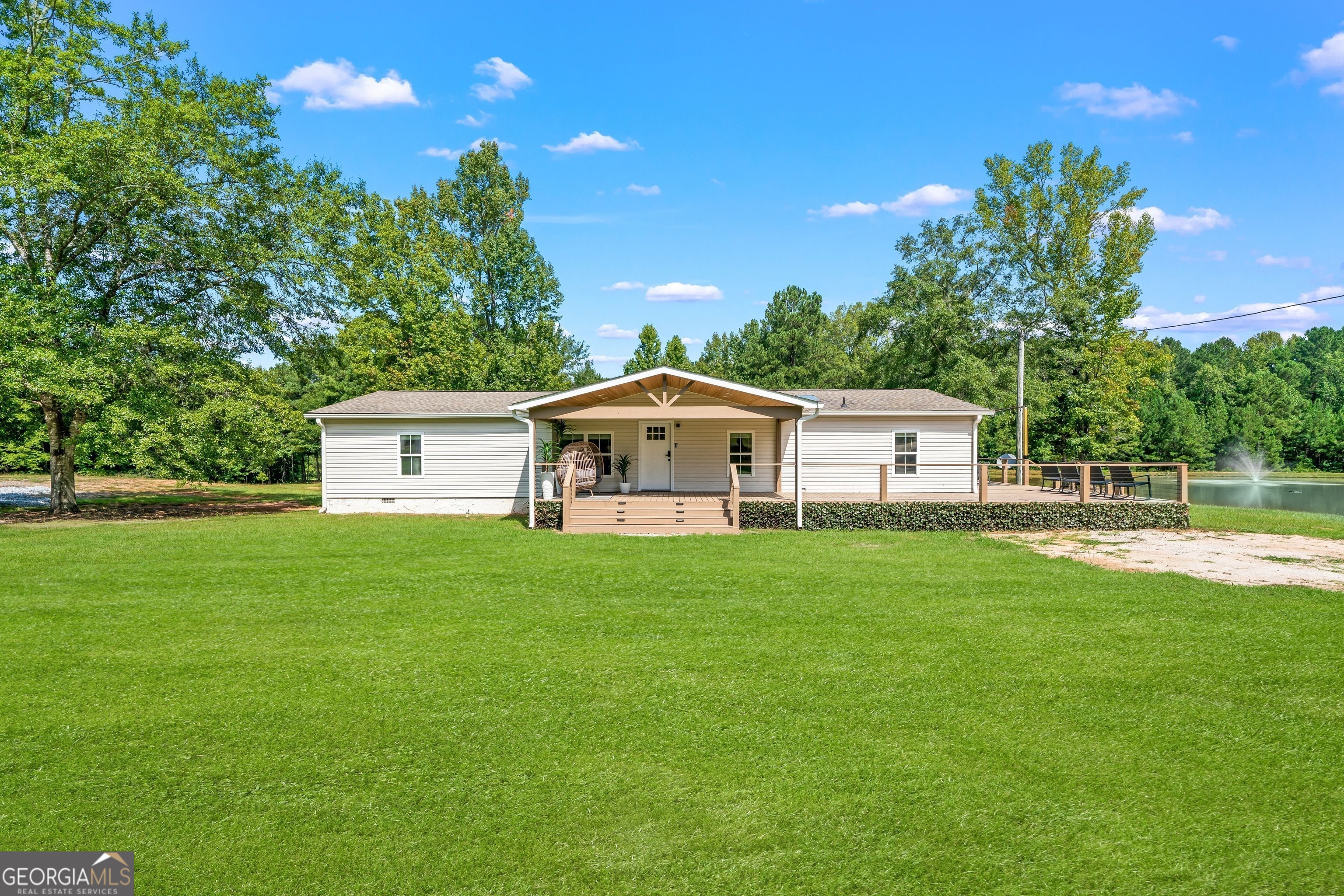 Looking for a beautiful and peaceful place to live. Do not look any further! Gorgeous home located in the Callaway school district. 30 Acres of land, of which 10 acres are open land. Metal Pole/Barn 50 x 100 x 17 Ft. Hight, with insulated roof and electrical features. Separated Carport as well. The house has 3 bedrooms, 2 bathrooms, laminate floors New insulated windows, new entrance doors, new decks. Large kitchen with granite countertops and peninsula, with stainless steel appliances, an electric stove, breakfast space outside the kitchen. Large dining room with capacity for 10 people, spacious, Master bedroom with a spacious bathroom with bathtub, and 2 closets, 1 of which is a walk-in closet. Do not miss the opportunity to live in a beautiful place where you can fish, hunt, or enjoy private serenity.
