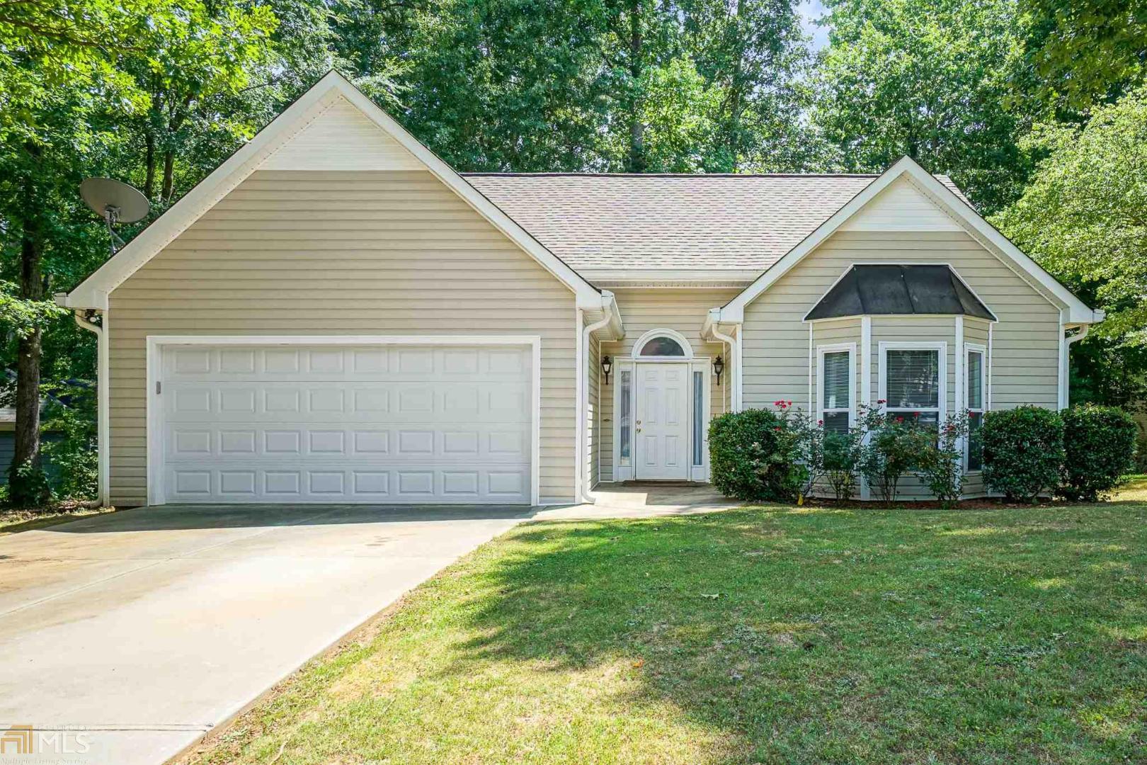 Preferred Rex Swim & Tennis Community! Amenities include secured gated tennis court, swimming pool, and playground. This Beautiful Upgraded Meticulous 3 BR Ranch home has it all! Open Foyer, Lg.Vaulted Ceiling Family Room, Hard Wood Floors, & Brick Fireplace. The Tiled Kitchen has a Breakfast Room with New Bay Window which overlooks the Wooded Fenced Backyard and Beautiful Wood Cabinetry, Pantry & Laundry. The Ex.Lg Vaulted Master Suite has a Tiled Bath with a Walk-in Closet, Spa Tub & Sep. Shower w/ Dbl Vanity. The extra two BRs are Bright and Spacious. Recently renovated w/new windows, new paint, HVAC, Garage Door, Deck, and Fenced Yard with New Storage Building. The Lg. 2 Car Garage has a level entrance into the Kitchen area. THIS HOME IS A MUST SEE!