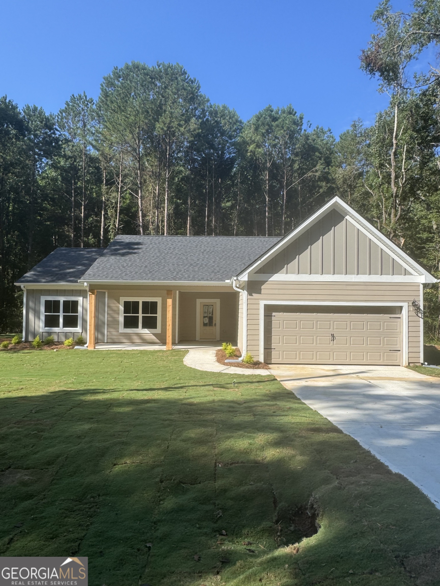 Experience the newest version of the Millie Plan by Chisel Mill Homes! This beautiful 4-bedroom, 2-bath ranch in the heart of Grantville, Coweta County with 1,673 sq ft of open-concept living. This home features a bright interior with ample natural light, a chef-ready kitchen with large island, a fireside family room, and a private owner's suite on the main level with a spacious bath. Modern comfort meets small-town charm here on Colley St! *Interior photos are stock photos from previous plan build*