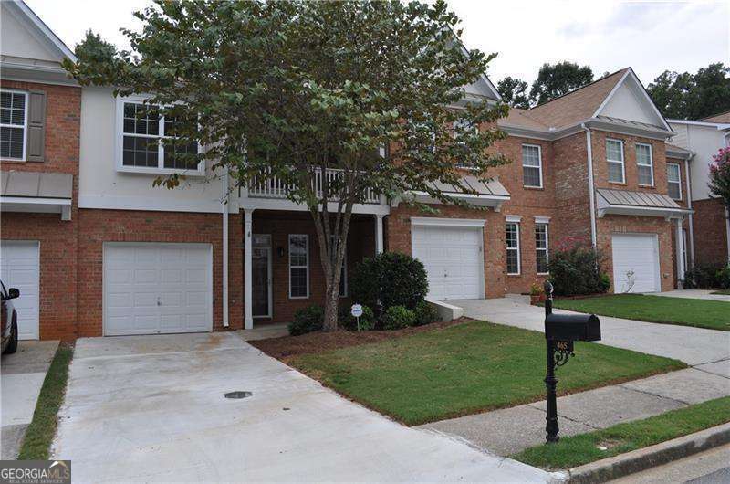 Fabulous Townhome in Alpharetta address and Forsyth County. Taxes. Spacious 3 Bedroom/2.5 Bath. Master Suite with Sitting room and two Walk-in closets. Spacious secondary baths- one with French door access to Private Deck. Kitchen with Granite Counters, backsplash with Stainless/Blk Appliances. including Gas Range. Sunroom has Tree Line View of Back Yard. Great Location mins. to GA 400, Hwy 9, Shopping, Restaurants and Halcyon. Vacant & move-in Ready. Property is available for immediate occupancy!