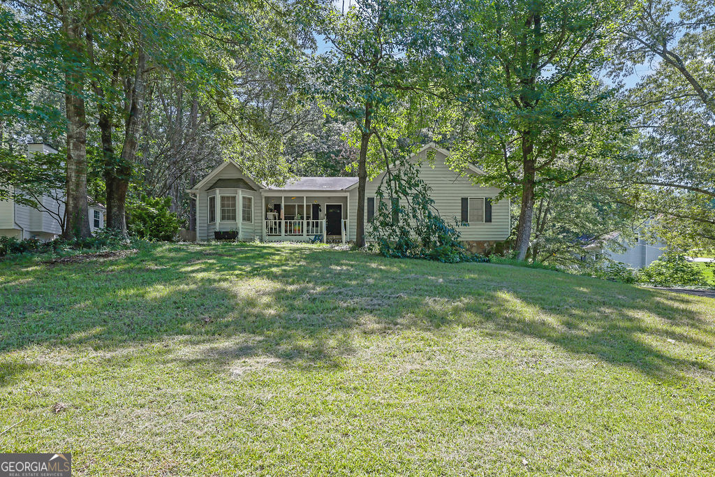 3 bedroom 2 bath, ready for you to make it your own! Large yard with a fenced backyard. So much potential! Sold As-Is.