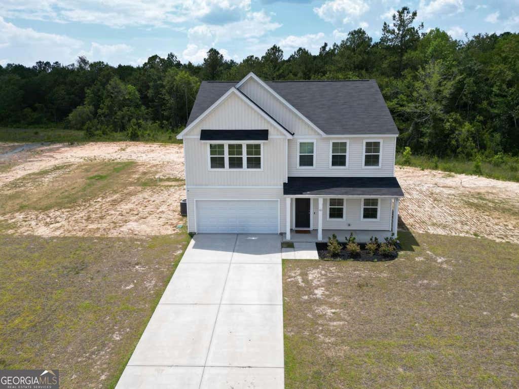 Photo of 82 Tatum Trail NE, Ludowici, GA 31316 (MLS # 10787598)