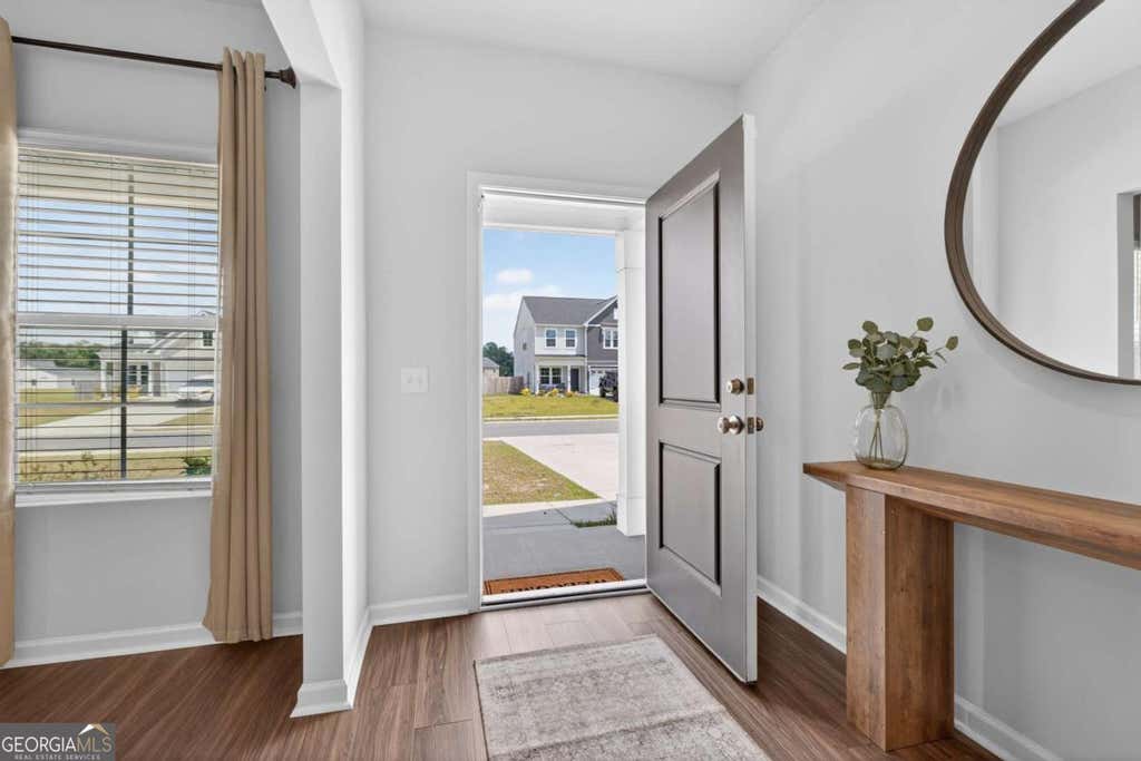 Photo of 82 Tatum Trail NE, Ludowici, GA 31316 (MLS # 10787598)