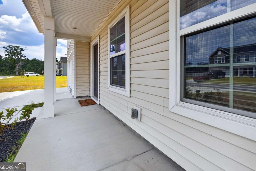 Photo of 82 Tatum Trail NE, Ludowici, GA 31316 (MLS # 10787598)