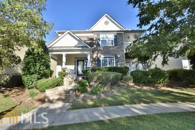 Cozy home in a charming Suwanee neighborhood. Has fresh paint, new hardwood floors on the main floor and a fenced yard. Features a foyer, family room, dining room, kitchen with a breakfast area and 2 patios. Upstairs features all the bedrooms with the master bedrm opening to a covered deck. Master bath has double vanity and separate tub and shower. Convenient location near the Suwanee Town Center.
