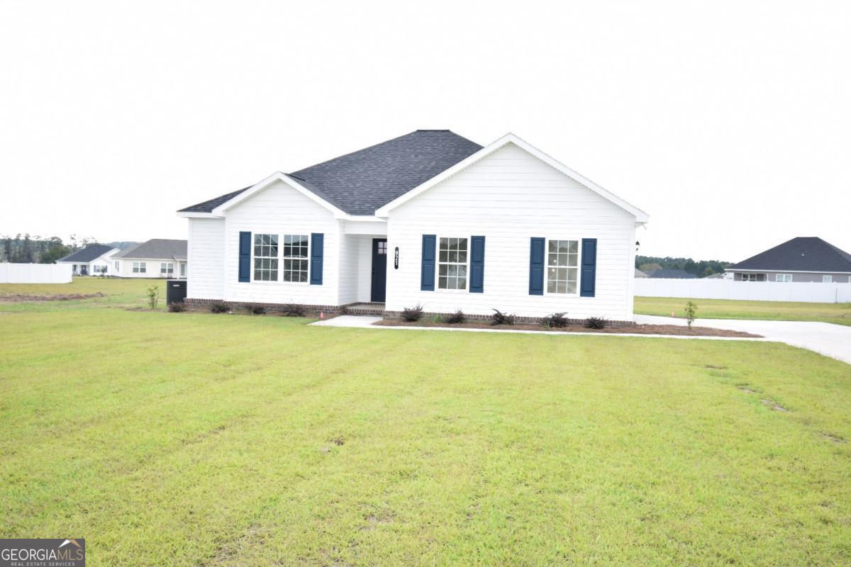 Welcome to this beautifully crafted new construction home located in the desirable Smith Creek subdivision. Featuring a smart split-bedroom floor plan, this home offers both privacy and comfort for todays lifestyle.Step into a welcoming foyer entrance that opens into a spacious living area with soaring cathedral ceilings, creating an airy, open feel throughout the main living space. The open-concept design includes a large great room, dedicated dining area, and a thoughtfully designed kitchen complete with a spacious walk-in pantry-perfect for storage and organization. Enjoy generous walk-in closets in every bedroom, offering ample storage and convenience. The owner's suite is privately situated and features a luxurious en-suite bath and large closet space. Situated on a beautiful 0.76-acre lot, there's plenty of room to relax, entertain, or expand your outdoor living space.