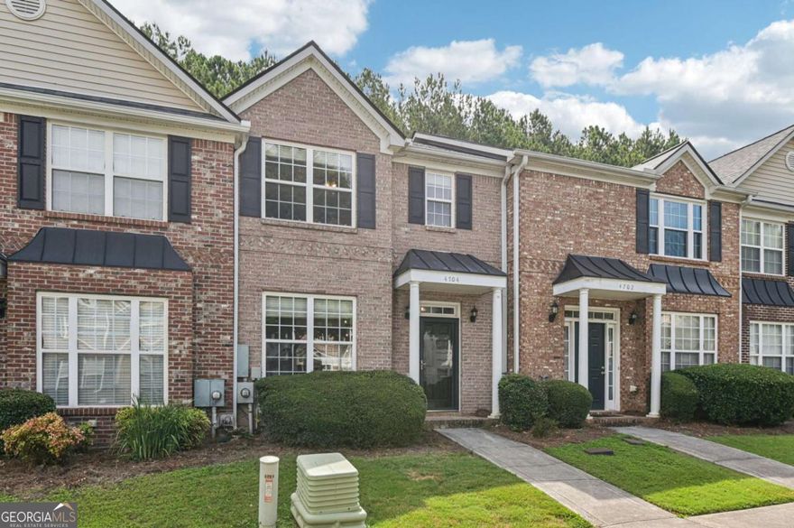 Stylish, Move-In Ready Townhome in Liberty Square - New Roof, New Carpet, No Rental Restrictions!    Offer Deadline of 11/23/2025 5:00 PM EST  Welcome home to this like-new 2-bedroom, 2.5-bath brick-front townhome located in the highly sought-after Liberty Square community! With a brand new roof, new carpet, and no rental restrictions, this home is perfect for both homeowners and savvy investors.    Step inside to a bright, open floor plan flooded with natural light and wood-look flooring throughout the main level. The spacious kitchen features stainless steel appliances, granite countertops, rich cabinetry, and a large breakfast area with a breakfast bar overlooking the family room. Enjoy cozy nights by the corner brick fireplace and relaxing mornings by the oversized picture window.    Upstairs, you'll find two oversized bedrooms, each with its own private bath-ideal for roommates or dual suites. The washer and dryer are included, making this home truly turn-key!    Step outside to a private, fenced-in patio with space for a garden-perfect for growing vegetables or flowers.    Enjoy everything Liberty Square has to offer: a clubhouse, pool, tennis courts, playground, pavilions, and more-all just moments from I-75 for a quick and easy commute.     Bonus: Qualified buyers may be eligible for discounted rate options and no-lender-fee future refinancing.    This one won't last-schedule your showing today and make it yours!