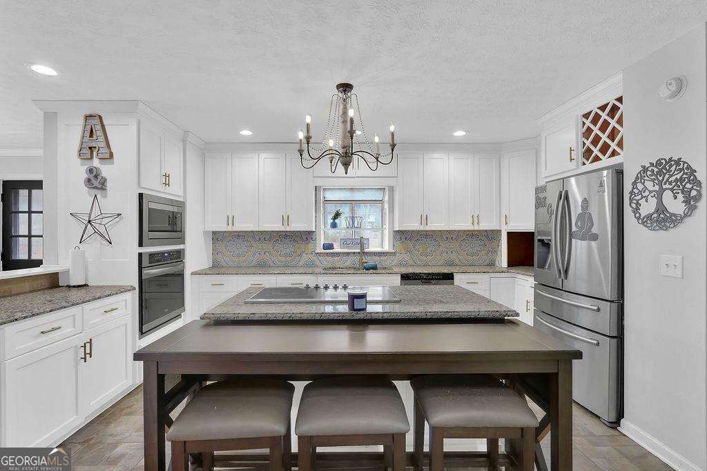 Photo of 4403 Milton Trail SW, Snellville, GA 30039 (MLS # 10721173)