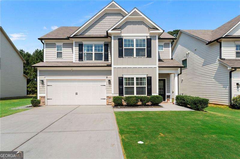 From its elegant interiors to its backyard retreat, this 4-bedroom, 2.5-bath home offers everything today's buyer is searching for. With 2,370 square feet of living space, located in the Park at Cedarcrest community and the sought-after North Paulding High School District, this property blends comfort, convenience, and style. The inviting open floor plan is filled with natural light and features hardwood floors throughout, fresh interior and exterior paint, and new fixtures. At the heart of the home, the gourmet kitchen is equipped with granite countertops, stainless steel appliances, and newer dishwasher, creating the perfect space to cook, entertain, and gather with family and friends. Step outside to your own private oasis. The large fenced backyard has been transformed with professional landscaping, new sod, and a stunning heated gunite in-ground pool. A covered patio and generous outdoor living space make it easy to relax or host guests year-round. Every detail has been carefully considered, from the epoxy-finished garage flooring to the newer HVAC system, ensuring both comfort and peace of mind. With its prime location close to shopping, parks, golf, and schools, this home truly has it all. Don't miss the chance to make this exceptional property yours.