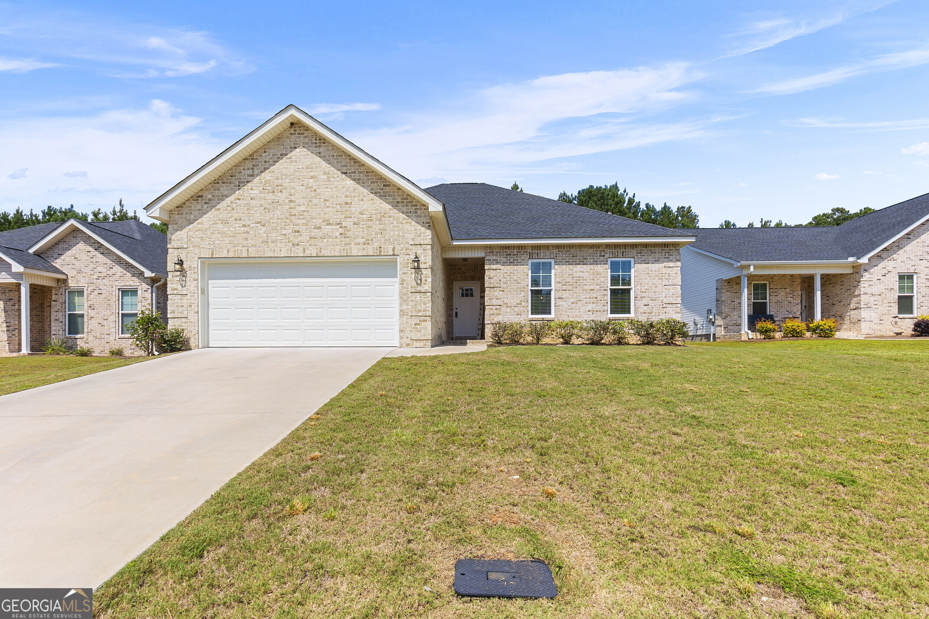 Built in 2022, this adorable 3-bedroom, 2-bath home blends charm with modern convenience. The open floor plan features a spacious living area, a breakfast bar, and an eat-in kitchen perfect for casual meals or entertaining. A designated office/sitting room adds flexible space for work or relaxation. The large primary suite boasts an ensuite bath and generous walk-in closets. With a split-bedroom layout for privacy, a fully fenced backyard, and a location close to shopping and dining, this move-in ready home checks all the boxes!