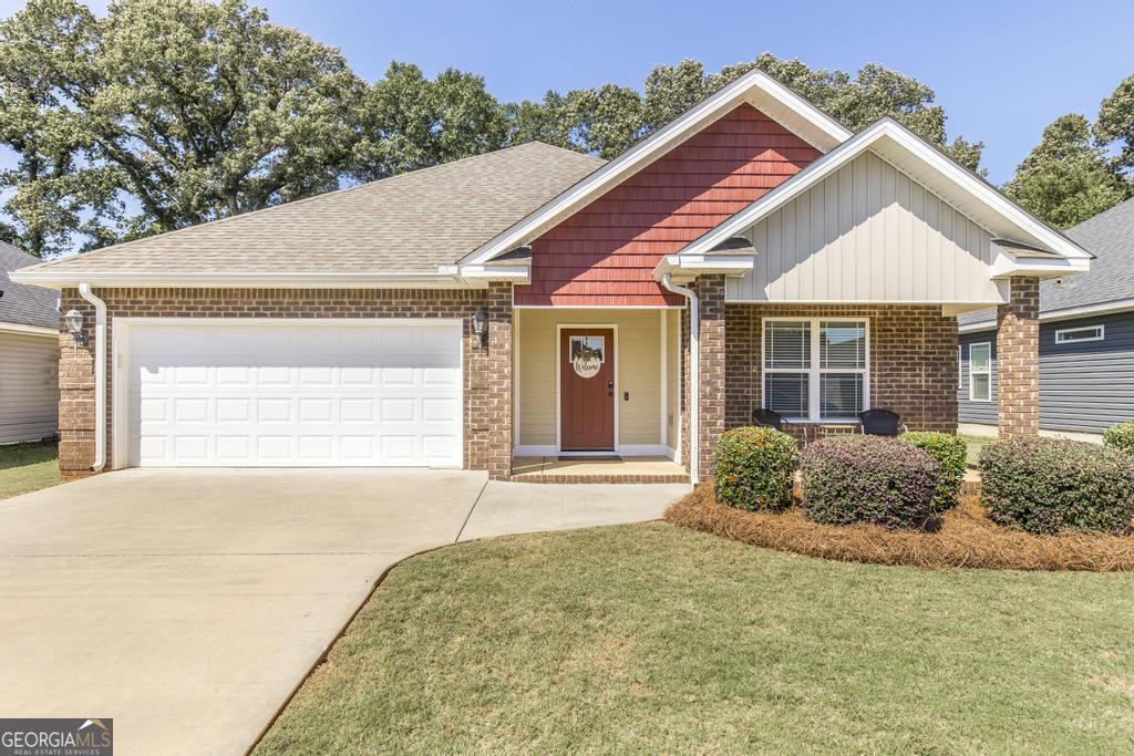 Location, Location, Location...Close to I75, Warner Robins & Macon. This home is absolutely adorable and well maintained. You can sit on the front porch and enjoy your neighbors or sit on the covered back patio in total privacy and enjoy the view of the trees. Open concept floor plan w/ a bar area in the kitchen, pantry & Granite countertops. This AWESOME home has a fireplace in the Living Room, there's a Formal Dining Room, the Primary Suite has a walk in closet, the bathroom has a large corner soaking tub, Tile Shower & double vanities. 100% USDA Financing eligible.