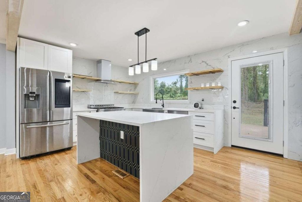 Photo of 1971 Honeysuckle Lane SW, Atlanta, GA 30311 (MLS # 10625073)