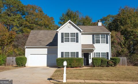 Photo of 8201 N Sterling Lakes Drive, Covington, GA 30014 (MLS # 10646877)