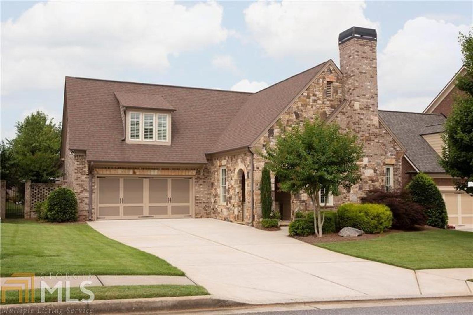 GORGEOUS Home on Private Interior lot in Cadence at Woodmont Golf & Country Club, Cherokee County's Finest Gated 55+ Neighborhood! The Sought-after Rockwell Plan features Charm Galore! Beautiful Stone and Brick Exterior. 2 Fireplaces: Fireside Living Room + Fireside Family Room. The Kitchen is FABULOUS -you'll Love the Huge Island! The Spacious Master Suite includes a Spa-like Bath with Tub & Separate Shower. Guest Suite on Main. Rec. Room and Full Guest Suite on 2nd floor. Lovely Outdoor Living with Covered Paver Patio. 40 Photos Soon!