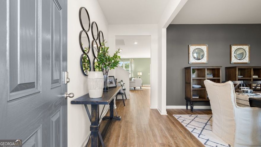 MINUTES TO I-85 & 30MINUTES TO DOWNTOWN ATLANTA. One mile to Piedmont Hospital, restaurants, great schools and lots of shopping. The Hayden floorplan at Poplar Preserve is a two-story home offering 2,511 sq. ft. of living space across 5 bedrooms and 3 full bathrooms. The 2-car garage ensures plenty of space for vehicles and storage.  Your style, your way. This expansive plan is one of our most popular, offering a flex space that could be tailored to become a dedicated home office or formal dining room. A guest bedroom with full bath on the main provides the ultimate retreat for visiting family and guests. There is also a central family room that opens to the kitchen, a space that boasts an extended island with bar stool seating, quartz countertops and stainless-steel appliances.  Upstairs features a generous bedroom suite with spa-like bath featuring dual vanities, shower and separate garden tub plus lots if closet space. There is also a versatile loft perfect as a secondary family room for movie nights and game day.  And you will never be too far from home with "Home Is Connected".  Your new home is built with an industry leading suite of smart home products that keep you connected with the people and place you value most.  Photos used for illustrative purposes and may not depict actual home.