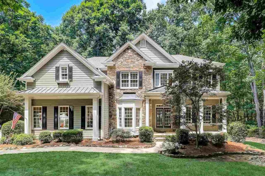 Alpharetta Address, Forsyth Taxes + Schools! Over two acres! Beautiful outdoor area with fireplace / Three Finished Levels / Light-Filled Two-Story Great Room / Spacious Owner's Suite / Closets with Built-In Organization/ Expansive Terrace Level Perfect for Entertaining / Media Room / Billiards Room / Hot Tub / Fitness Area / Additional Bedroom and Full Bathroom Downstairs / Tennis Courts + Playground