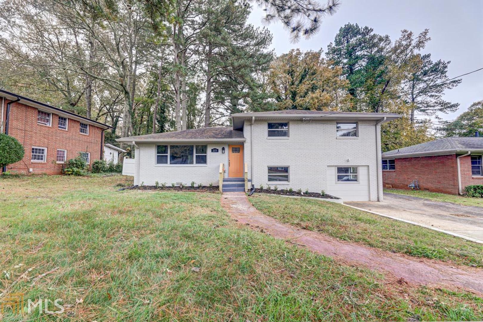 Brilliantly renovated 4BR/2B split-level just minutes from Decatur, Oakhurst, and Kirkwood. Open Concept with bright, spacious rooms. Kitchen boasts white cabinets, granite counter-tops, stainless appliances, and large Island with breakfast bar that overlooks Living Room. Gleaming hardwood floors, fresh paint, and new systems. Large Master Suite with double vanity, beautiful modern tile and huge shower. Separate laundry room. New deck overlooks level backyard. off-street parking in drive with additional parking pad. This home will not disappoint!!!