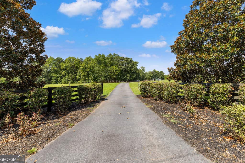 Photo of 1064 Chappell Mill Road, Milner, GA 30257 (MLS # 10829875)