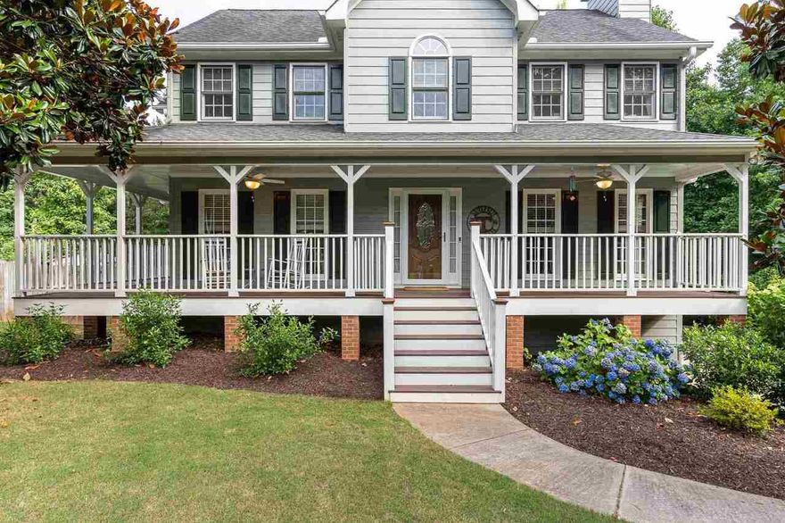 THIS IS THE ONE! NO HOA on .65 acre lot backing up to horse property!  Enjoy a rocking chair front porch, with Haint Blue ceilings, overlooking beautiful cul-de-sac.  A LOT of natural light brightens up this 4-bedroom, 2.5 bath within 15 minutes of Downtown Woodstock or Downtown Canton and easy access to I-575 via Sixes Rd Exit.The recent addition of the Four Seasons Room allows you to comfortably enjoy watching family members or pets play in the private fenced-in back yard, or just relax drinking coffee as the sun comes up each morning.  BRAND NEW HVAC and Water Heater (July 1, 2021)!  Exterior paint and deck stain less than two years old!  Hard wood floors are throughout the entire home.  The kitchen upgrades include Thomasville Cherry Cabinets, Granite Counter Tops, and Stainless Steel Stove/Oven.  The garage is FULL of space, and the unfinished basement can easily be converted into a 5th bedroom with a bathroom.  Owners are even willing to leave additional custom Thomasville Cabinetry purchased for a bathroom, so you are one step closer to adding square footage.  There is ANOTHER area to relax in the back yard on large concrete back patio wired for speakers.  With close to $100k being invested into this home in the last couple of years, this house is move-in ready for you to build a life-time of memories.