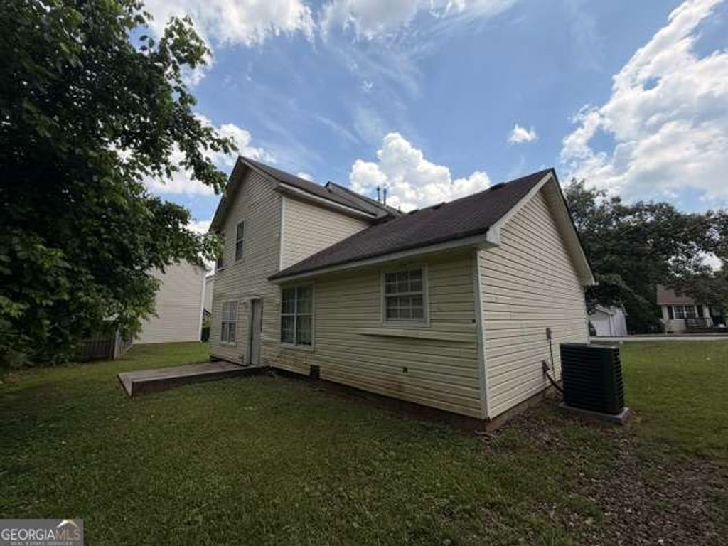 Photo of 4099 WARD LAKE Trail, Ellenwood, GA 30294 (MLS # 10773177)
