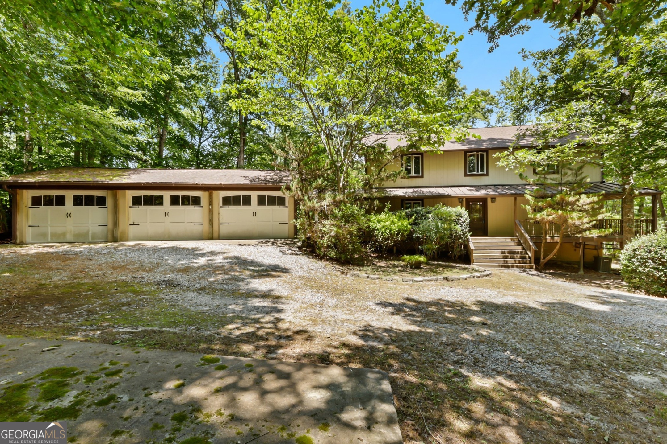 A Rare Lakefront Estate in the Heart of Milton. Calling all investors, builders, and savvy home buyers! Welcome to 13370 Providence Park Drive - an EXCEPTIONAL OPPORTUNITY to transform or create your private lake access retreat with NO HOA. Nestled in one of Milton's most coveted areas, this traditional craftsman-style home exudes rustic charm and cabin-like serenity with hardwood floors throughout, exposed beam ceilings, and a spacious open-concept layout. Soaring cathedral ceilings and panoramic lake views fill the oversized loft area with natural light, while the main level offers warm, inviting living and dining spaces that open directly to tranquil water views. The gourmet kitchen is built for serious chefs, featuring a six-burner cooktop, 60" built-in refrigerator/freezer, and breakfast bar - all just waiting to be personalized to your taste. The main level primary suite offers a relaxing escape and lake views with an upgraded en suite bath that includes dual vanities, a soaking tub, and a glass-enclosed spa-style shower with rainflow and body jet fixtures. Upstairs, you'll find three generously sized bedrooms and two full bathrooms - perfect for guests or growing households. Enjoy peaceful mornings on the oversized rocking chair front porch or unwind in the screened-in back porch overlooking your future lakefront oasis. Whether you're imagining a full renovation or building your dream estate, this property invites vision and creativity in one of Milton's most private & intimate settings. Walking distance to Providence Park and just minutes from Downtown Alpharetta, Avalon, and top-rated schools - plus surrounded by equestrian estates and luxury homes, including recent sales over $4M just across the shared lake - this is a rare chance to invest in your future and enjoy a truly unmatched lifestyle. Bring your vision. Bring your builder. Opportunities like this don't come around often. SOLD AS IS.