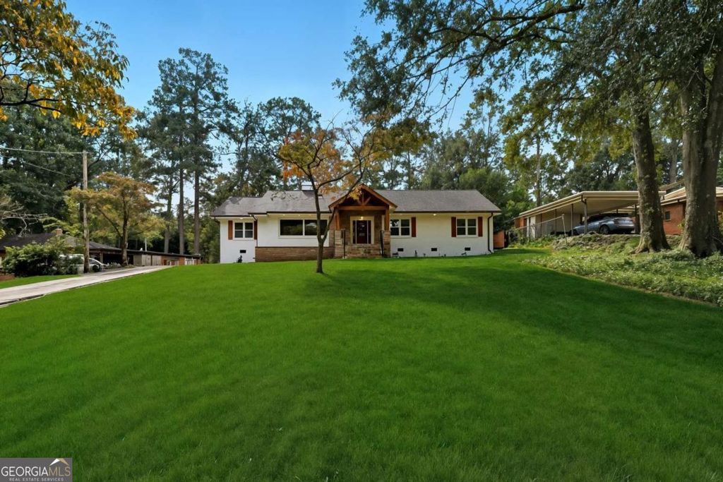 Photo of 2304 Rugby Lane, Atlanta, GA 30337 (MLS # 10624347)