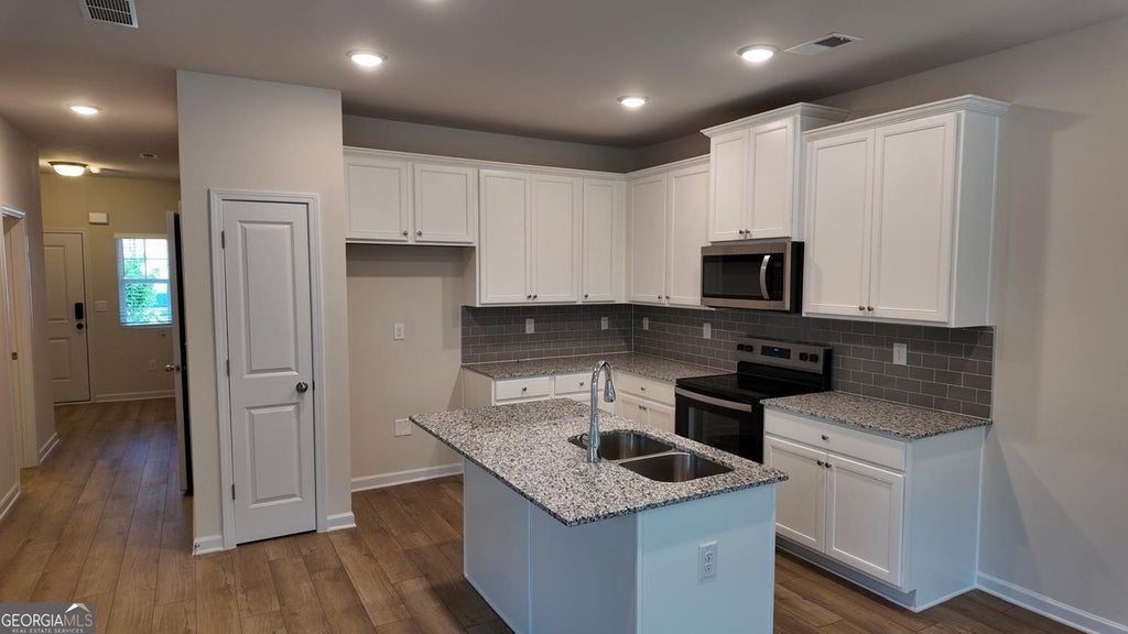 Photo of 133 Jaxton Street, Hoschton, GA 30548 (MLS # 10817469)