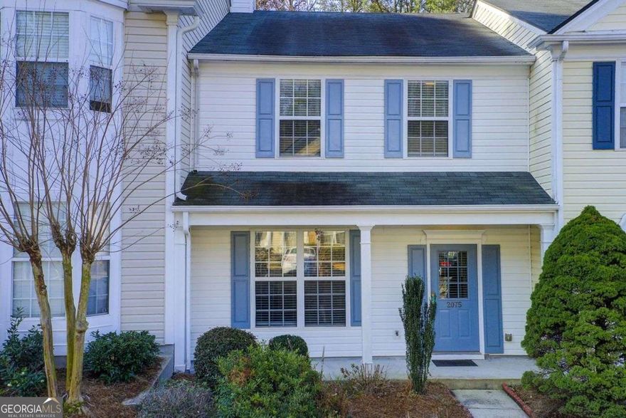 CHARMING 3-BEDROOM TOWNHOUSE IN PRIME ALPHARETTA LOCATION! Welcome to this beautifully maintained 3-bedroom, 2.5-bathroom townhouse in a highly sought-after location! Nestled in a quiet neighborhood within the top-rated Alpharetta High School District, this home offers convenience, comfort, and incredible value. Ideally situated less than 2 miles from GA-400, Avalon, North Point Mall, and more, you'll enjoy easy access to premier shopping, dining, and entertainment. Inside, the open-concept main floor features hardwood floors, a spacious family room with a real wood-burning fireplace, and a well-appointed kitchen with beautiful cabinetry, stainless steel appliances, and granite countertops. A convenient half bath completes the main level. Upstairs, you'll find three bedrooms, including a generously sized primary suite with an en-suite bath, plus an additional full bathroom. A washer and dryer closet is also located upstairs, offering added convenience. Step outside to your private backyard with serene wooded views, providing a peaceful retreat. With a low HOA fee covering yard maintenance, water, and termite bond, this home provides exceptional value and low-maintenance living. Don't miss this opportunity - schedule your showing today!