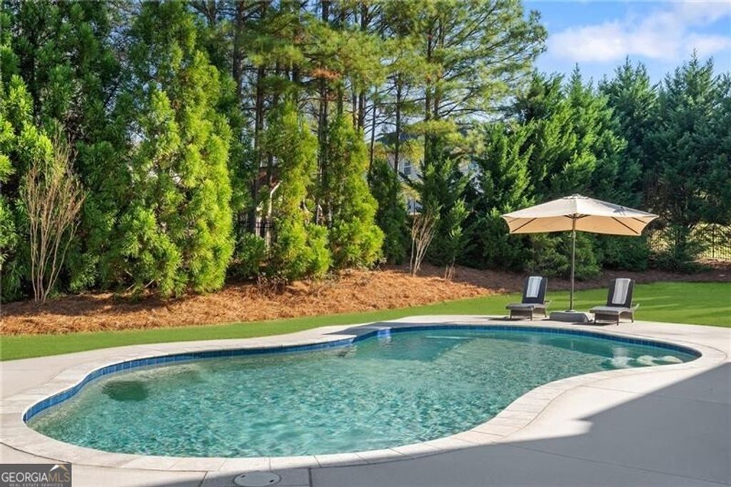 Photo of 6660 Tulip Plantation Road, Alpharetta, GA 30004 (MLS # 10653327)