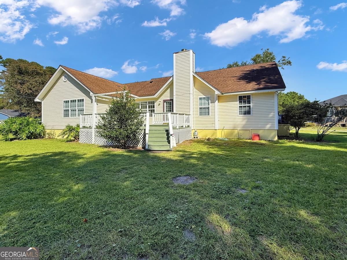 A Rare Find-No HOA, Prime Location, and Room to Make It Yours If you've been searching for a well-maintained home in a quiet neighborhood without the rules or fees of an HOA-this is it. Perfectly positioned just off Highway 17, this property offers quick, convenient access to St. Simons Island, Jekyll Island, and all the shopping, dining, and coastal charm of Brunswick. Whether you're relocating, right-sizing, or simply ready for a fresh start, you'll appreciate the flexibility, space, and freedom this home offers. Inside Features: Step inside to discover a spacious layout with vaulted ceilings, a desirable split floor plan, and thoughtful details throughout. The formal dining room is perfect for hosting guests or enjoying weeknight dinners, while the large eat-in kitchen boasts a center island, ample cabinetry, and included appliances-refrigerator, washer, and dryer are all part of the package. The primary suite is a peaceful retreat with its own vaulted ceiling, generous walk-in closet, and a spacious en suite bath featuring a double vanity, garden tub, and separate shower. On the opposite side of the home, you'll find two additional bedrooms and a full bath-perfect for guests, a home office, or hobbies. New HVAC and Water Heater installed in 2025-big-ticket upgrades already taken care of! Outdoor Living & Extras: Step outside to enjoy a large back deck-perfect for morning coffee, grilling out, or entertaining friends. A 2-car garage provides additional storage and everyday convenience. With great natural light, solid bones, and a price that leaves room to personalize, this home is ready to welcome you.