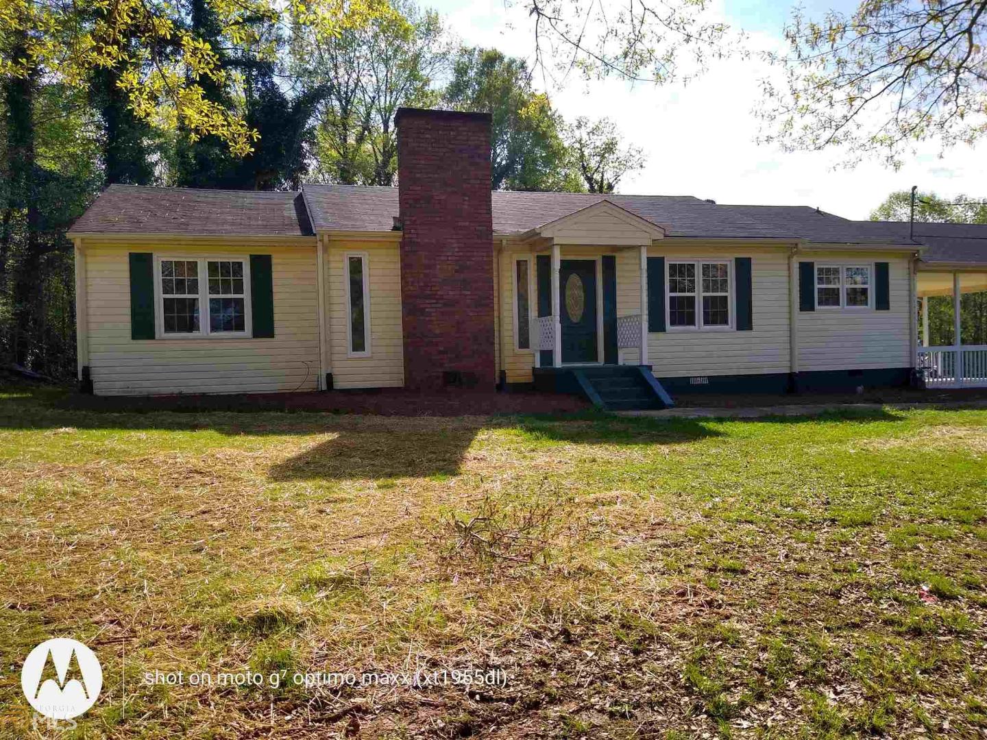 Recently renovated ranch style home sitting on 2 acres with newly refinished hardwood floors, new stainless steel appliances, new counter tops, uniquely tiled back-splash, new interior paint. Open living room/dining room combo and split bedroom plan. Maintenance free vinyl exterior, new back deck, kitchen level 2 car carport. This home sits off the road with large 28x35 work shop with (2) 12 foot bays suitable for boat/RV storage plus additional 12x22 outbuilding. This home offers easy access to downtown Buchanan, highways and local shopping.