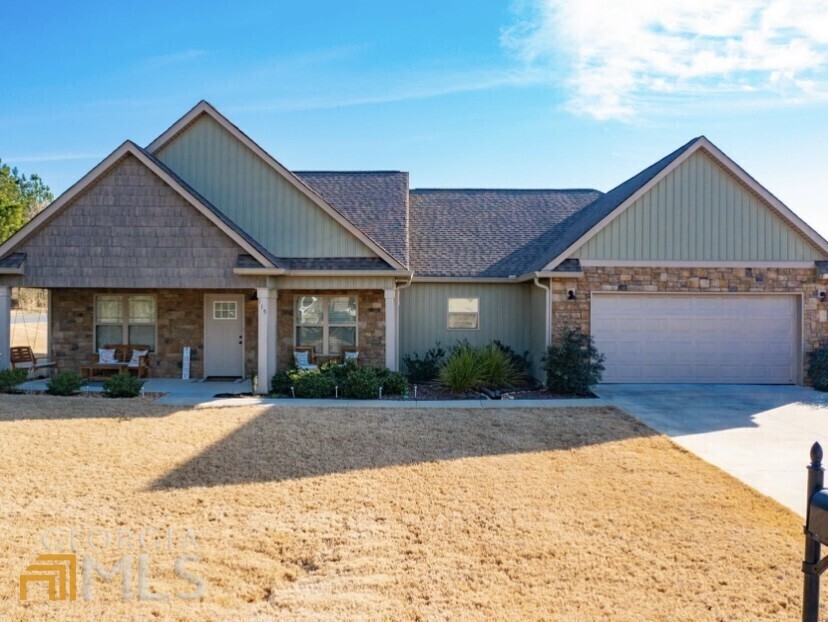 Welcome to beautiful Northwest Georgia! Come and feel this spacious and comfortable home nestled in the City limits of Calhoun! As you approach the home, you will first notice how pretty of a neighborhood you could be living in. The front of the home offers a comfortable covered patio to simply enjoy the weather. As you walk in, your eyes will be lit up with the prestigious living space! This gorgeous open concept home boast very nice weather resistant hardwood flooring. To add to the beauty are the wood-stained cabinets with crown moulding. Perfectly put together with granite counter tops and a massive kitchen island ideal for social gatherings! You will enjoy the warm and cozy rear patio. Perfect for those lovely evenings!