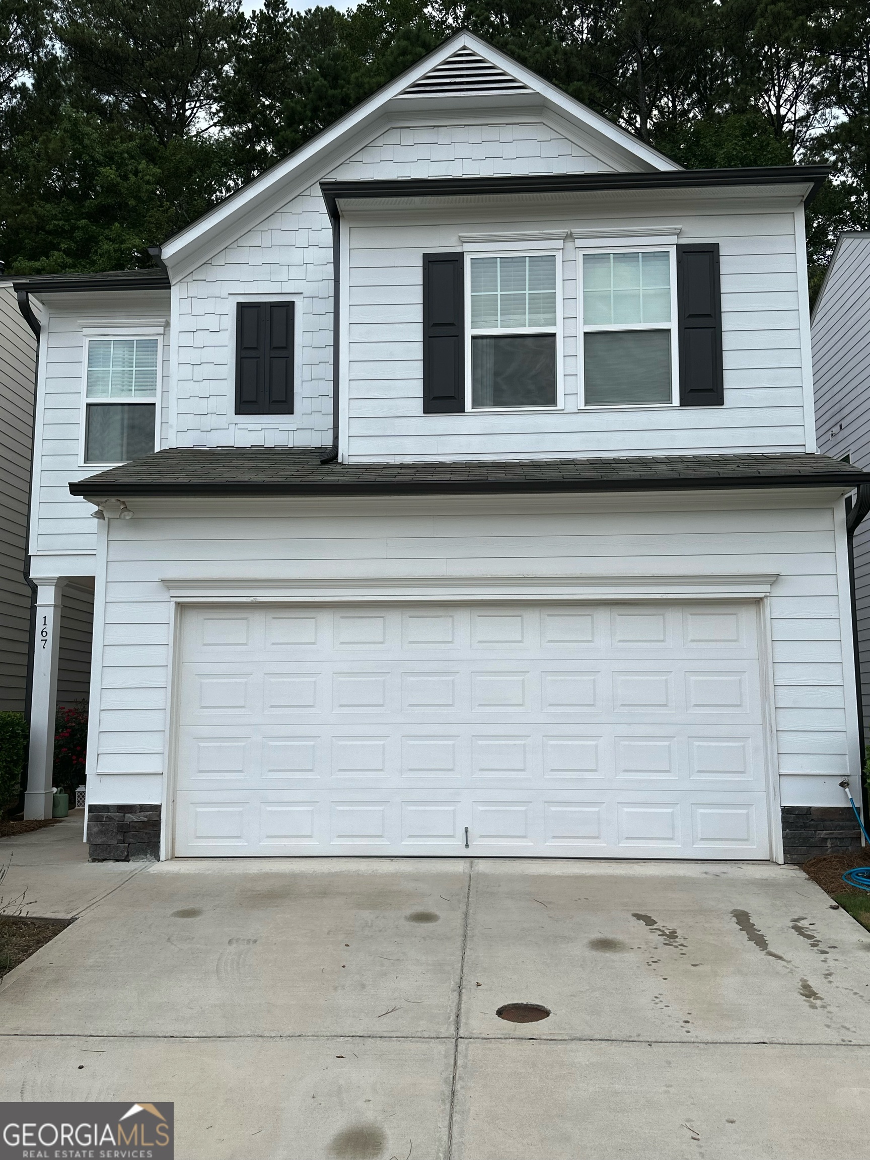 Beautiful Move-In Ready Home Near Lake Allatoona! This 3-bedroom, 2.5-bath home offers 1,804 sq ft of comfortable living in a prime Woodstock location. Built in 2020, it features an open-concept floor plan with a spacious kitchen including granite countertops, stainless steel appliances and a pantry. The large family room with a gas fireplace opens to a fully fenced, private backyard - perfect for relaxing or entertaining. Upstairs, enjoy a primary suite with double vanities, a soaking tub, separate shower, and a huge walk-in closet. Two additional bedrooms, a full bathroom, and a large landing area complete the second floor. Located minutes from Lake Allatoona, Downtown Woodstock, Towne Lake, and outlet shopping. Landscaping included in rent! Don't miss this great opportunity - schedule your showing today!