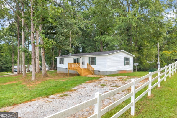 218 GAINESVILLE ST, CARNESVILLE, GA 30521 - Image b0d96e940ad19c4fff31e2e412aa79ae/3217719193