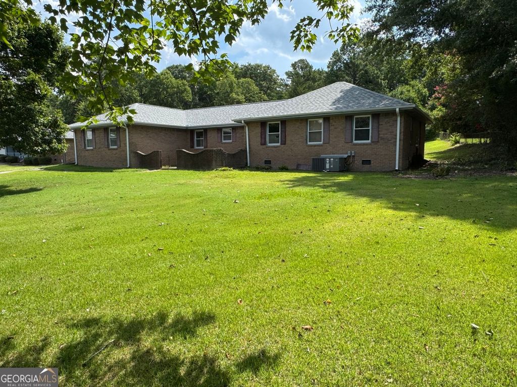 Photo of 1066 SW June Dr. Drive, Conyers, GA 30094 (MLS # 10806274)