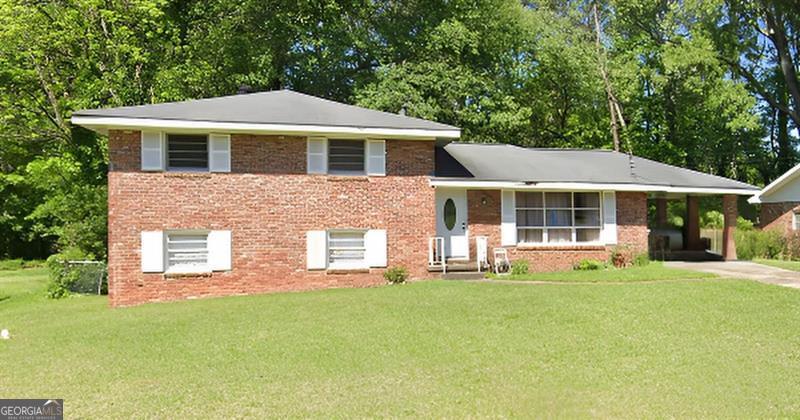 Prime Investor Opportunity! Don't miss this rare chance to acquire a 1961-built split-level gem, featuring 3 bedrooms, 2 baths, and approximately 2,008 sq ft on a generous 0.4-acre lot in sought-after DeKalb County. This no-disclosure, as-is investor special is perfect for a flip or rental-bring your vision and renovation expertise to unlock its full potential and capitalize on the neighborhood's strong value trajectory. Tucked in Decatur with easy metro connectivity, you're near Stone Mountain Park's hiking and seasonal attractions, historic East Lake Golf Club (home of the TOUR Championship), the Arabia Mountain National Heritage Area's miles of trails and granite outcrops, everyday shopping at The Gallery at South DeKalb, and MARTA's Indian Creek Station for quick commutes. This is your chance to transform this property into your next profitable venture!