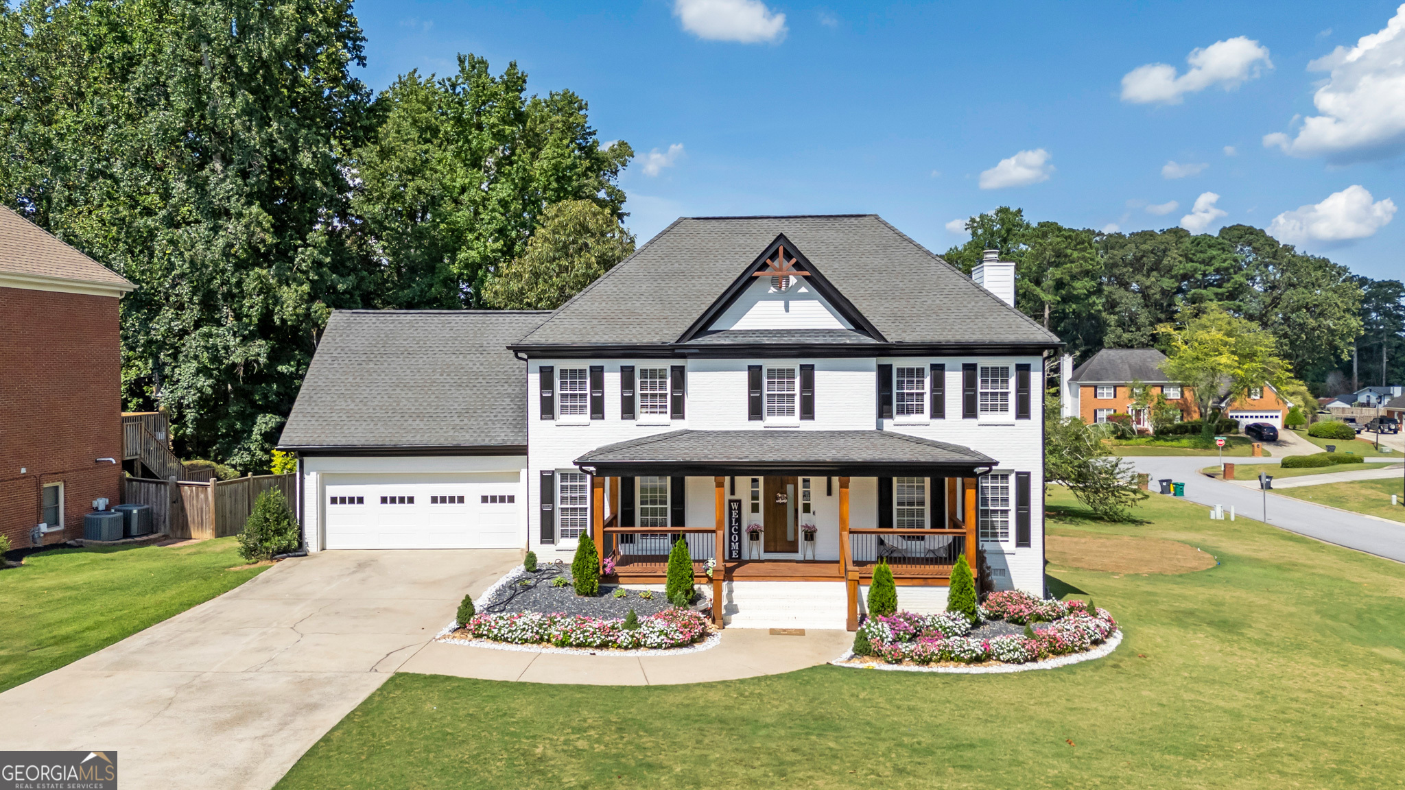 Welcome to 1908 Prince Drive in sought-after Lawrenceville, GA! This delightful 4-bedroom, 2.5-bath home offers a perfect blend of space, style, and comfort in a family-friendly neighborhood. Step inside and be greeted by a bright, open layout featuring a large family room with vaulted ceilings, an inviting fireplace, and beautiful hardwood floors-ideal for both everyday living and entertaining. The spacious kitchen is a chef's dream, boasting granite countertops, stainless steel appliances, an oversized island, and a sunny breakfast nook. Upstairs, the luxurious primary suite includes a walk-in closet and a private ensuite bathroom with dual vanities, a soaking tub, and a separate shower. Three additional bedrooms and a full bathroom offer plenty of room for family, guests, or a home office. Outside, the home truly shines with a covered patio overlooking the landscaped, backyard-perfect for summer cookouts, relaxing weekends, or playtime. Located just minutes from top-rated schools, parks, shopping, dining, and major commuter routes, this move-in ready gem offers both convenience and charm. Don't miss your chance to make 1908 Prince Drive your forever home!