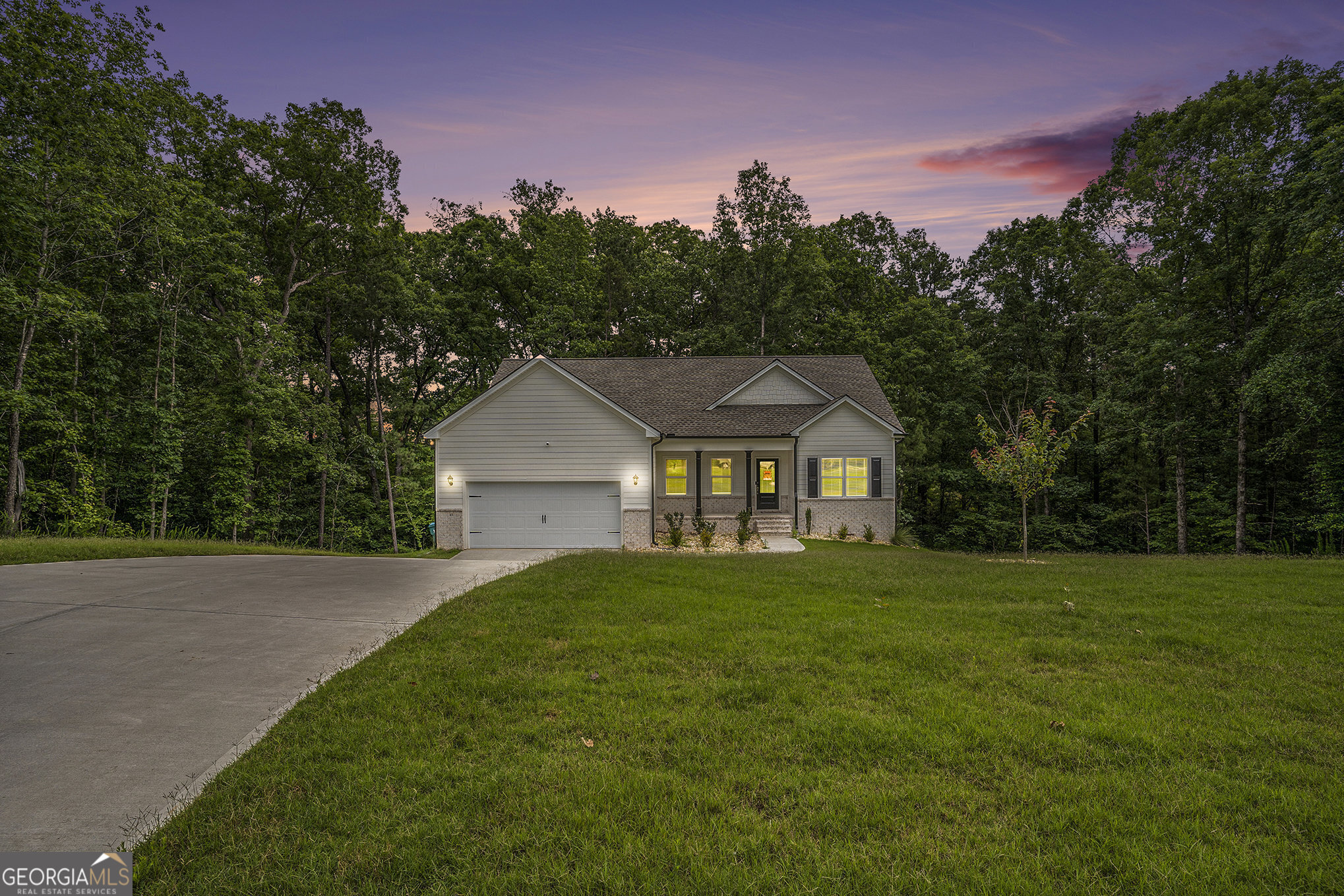 Spacious 4BR/3BA Home Minutes from Jackson Lake - Finished Basement & Major Upgrades! Located in peaceful Mansfield, GA, this beautifully updated 4-bedroom, 3-bathroom home offers the perfect blend of modern comfort and serene country living, just 30 minutes from downtown Covington, famously known as The Hollywood of the South. Step inside to find gorgeous hardwood floors and a chef's kitchen with granite countertops, ideal for cooking and entertaining. The home's open layout is warm and inviting, with generous space in every room. Even better, the seller has finished the full basement, adding valuable square footage for a home theater, guest suite, game room, or office. There is also a new and much larger two-story back porch, making it the perfect spot for relaxing or hosting gatherings. Other recent upgrades include a brand-new, high-quality roof (a step above standard builder grade), giving peace of mind for years to come. Located just minutes from beautiful Jackson Lake, this property is ideal for nature lovers, lake-goers, and anyone looking for a peaceful retreat that's still close to the action.