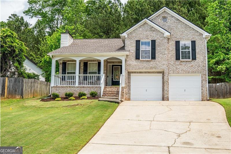 This Charming 4 bedroom open floor plan home is walking distance to Swift Cantrell Park and only Minutes from Historic Kennesaw and Kennesaw State University. Situated in a beautiful pool community and is close to shopping and restaurants. This brick front home features a rocking chair front porch, open floor plan and private oasis in the back yard. Upgraded and cared for beautifully inside and out. This home has all newer paint, lighting fixtures, backsplash, upgraded and newer bathrooms along with new flooring. Exterior paint and landscaping has been updated within last couple years. Newer roof on this home along with water heater and A/C makes this the perfect move in ready home. Basement bedroom has closet and half bath,but is not listed as a bedroom in the tax records. Don't miss out on this fantastic opportunity within this sought after community. Schedule your showing today! Current tenants need minimum of 24 hours notice for all showings.