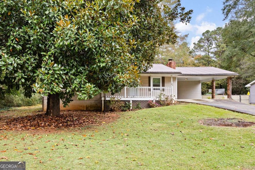 Welcome home to this beautifully renovated 3-bedroom, 2-bath ranch situated on a spacious, flat lot of over half an acre. Step inside to an open-concept floor plan that's perfect for modern living. The updated kitchen features white cabinets, stylish countertops, a tile backsplash, and a cozy breakfast area-all with a view to the inviting family room. Enjoy abundant natural light and a brick fireplace that serves as the centerpiece of the living space.The primary bedroom is generously sized, offering plenty of closet space and a private ensuite bath. Two additional bedrooms are well-proportioned and share a hall bath.Outdoor living is a highlight of this home, with a large screened-in porch and an additional deck-ideal for relaxing or entertaining. The expansive, fenced backyard is flat and open, providing plenty of room for recreation or gardening. An outbuilding with power offers great additional storage or workspace options.Home is being sold as-is, presenting a perfect opportunity for investors or anyone looking to add to their rental portfolio.
