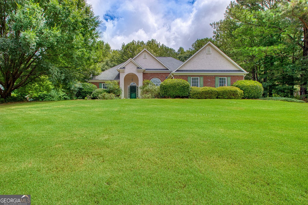 Photo of 305 Surrey Park Drive, Fayetteville, GA 30215 (MLS # 10806419)